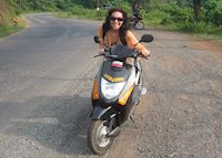 Sophie trying a local scooter